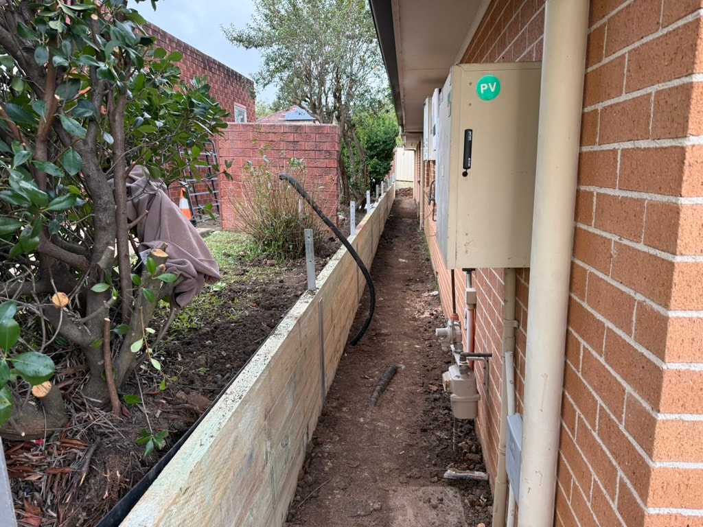 Timber and concrete sleeper retaining wall Sydney