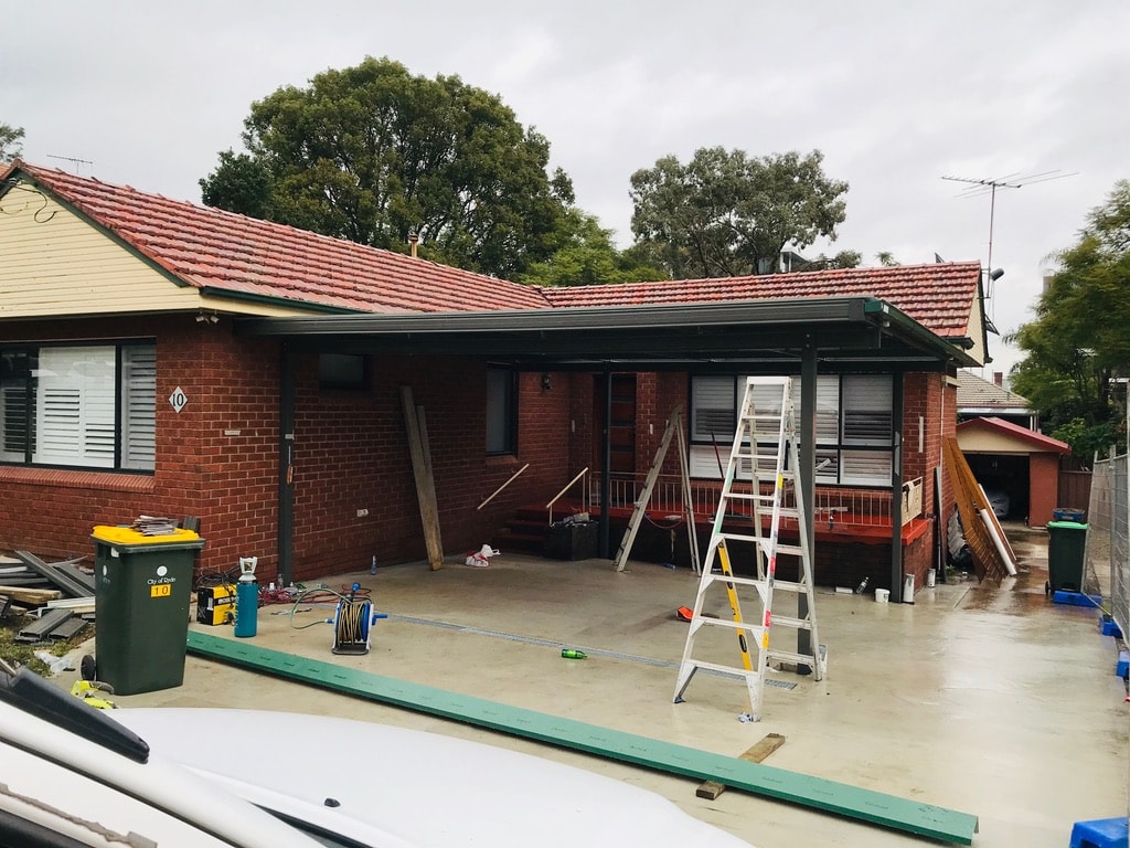 Home renovation construction site with excavation and site preparation
